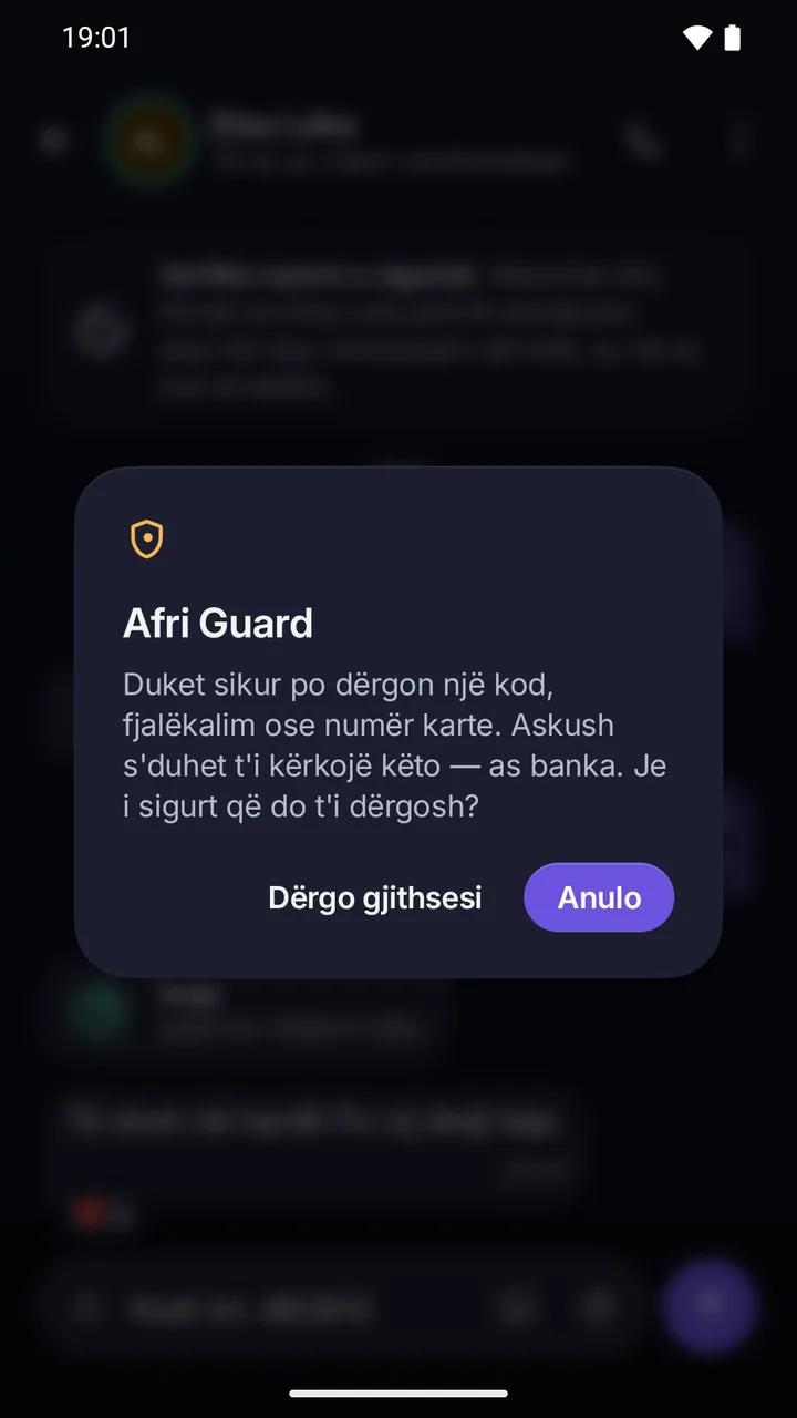 Afri Guard para dërgimit: duket sikur po dërgon një kod, fjalëkalim ose numër karte; Dërgo gjithsesi ose Anulo.